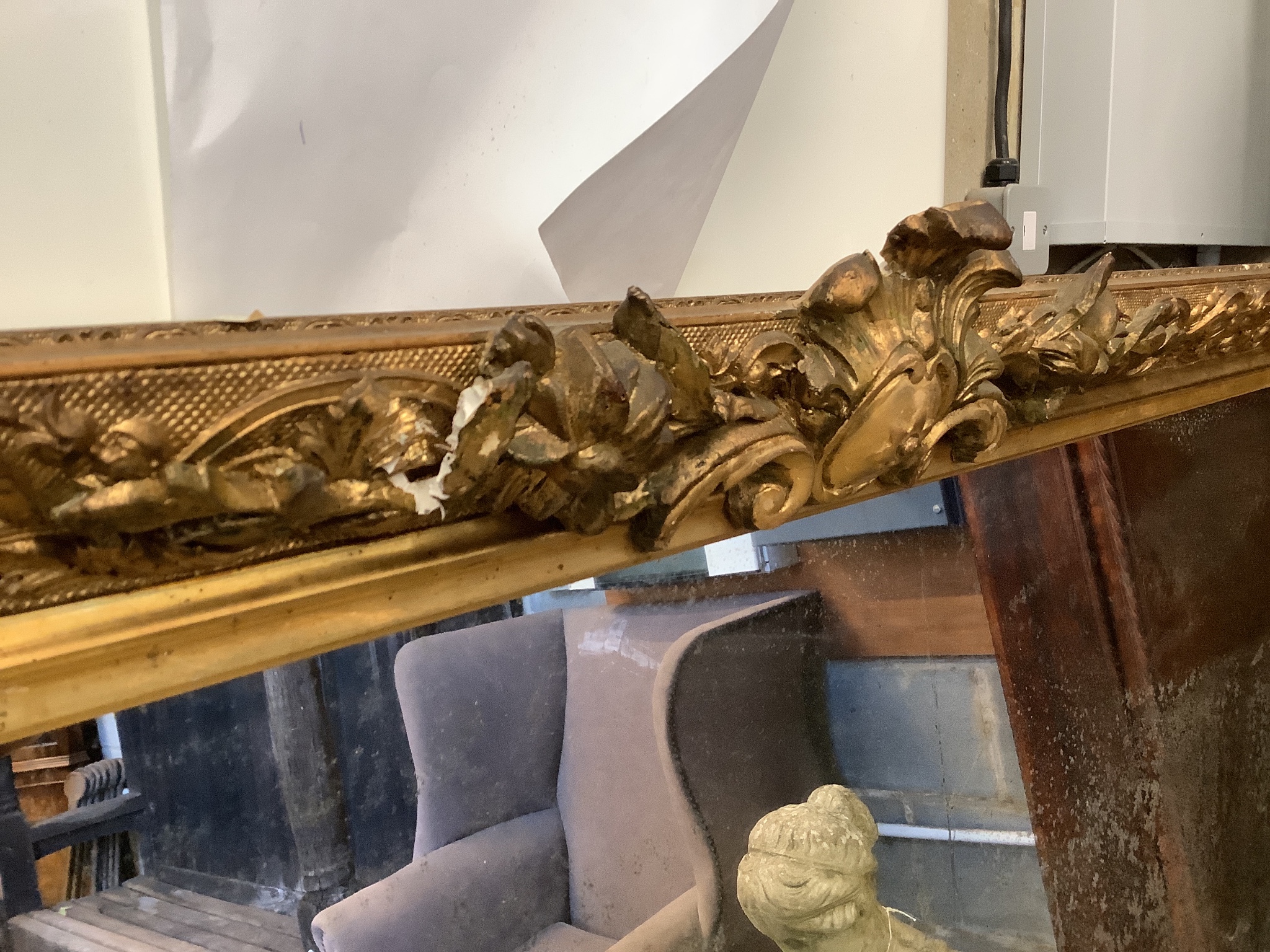 A late 19th / early 20th century giltwood and gesso overmantel mirror, width 133cm, height 138cm